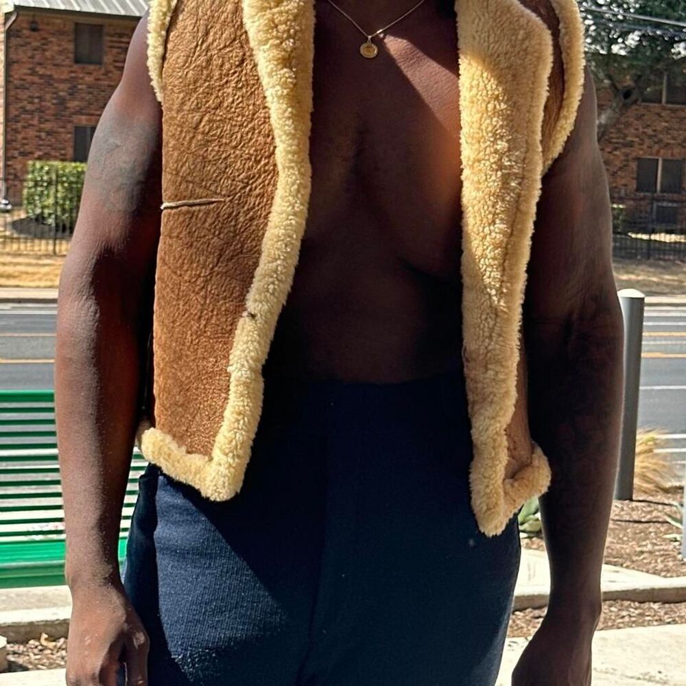 brown and shearling leather vest